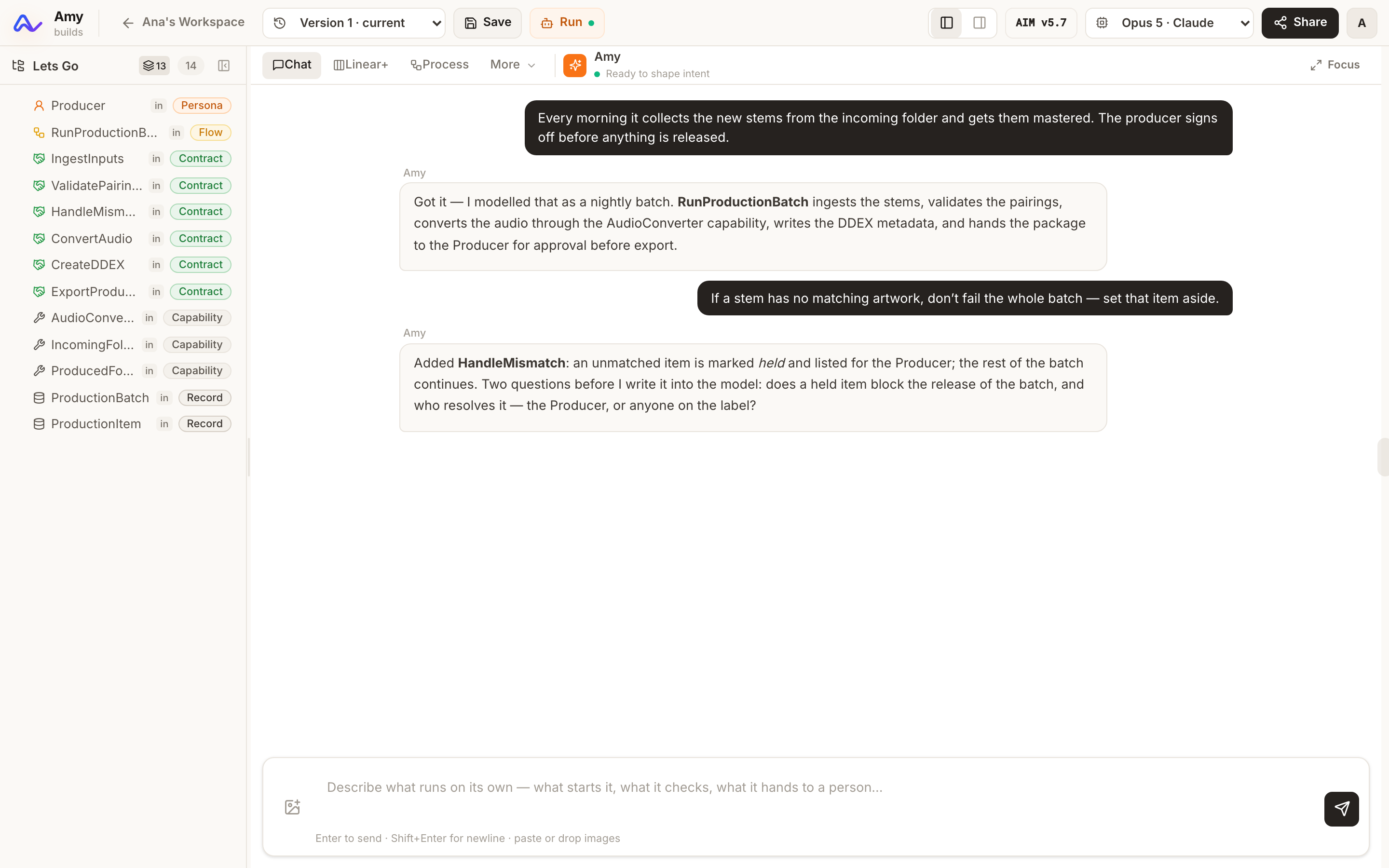 Amy in the IDE: the conversation builds the intent tree on the left, one persona, flow, contract, capability and record at a time.